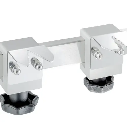 Tube holder with rail clamp